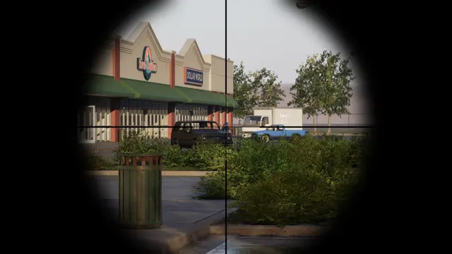 View through a rifle scope toward a shopping strip